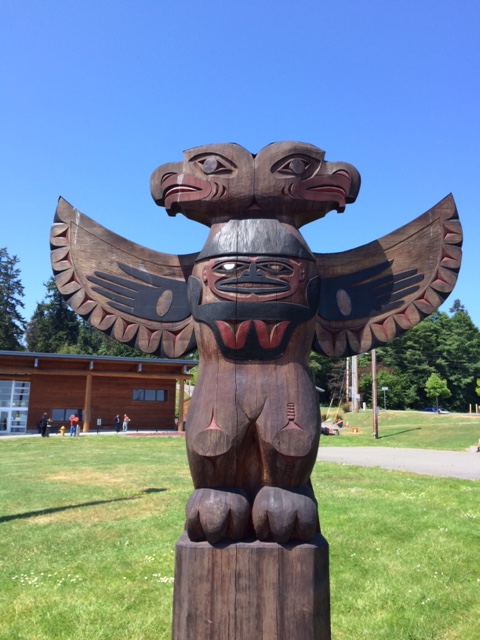Totem outside of the Suquamish Tribe's longhouse.