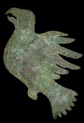 Copper bird recovered from Mound City. Long described as a falcon, the piece may represent an extinct Carolina parakeet. Photo NPS.