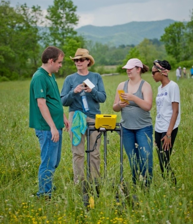 Jane Eastman and students conducting a ground-penetrating radar survey.