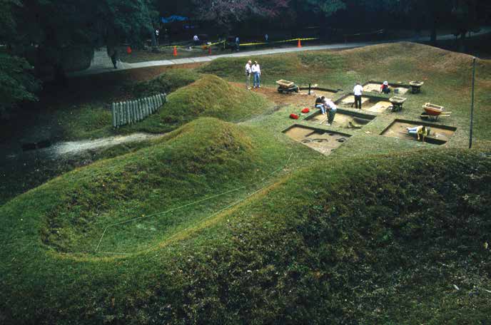 Archaeologists excavate around and within Fort Raleigh’s reconstructed earthwork in 1990. CREDIT: Ira Block