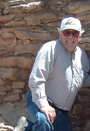 Larry L Baker at work stabilizing ruins in 2004. 