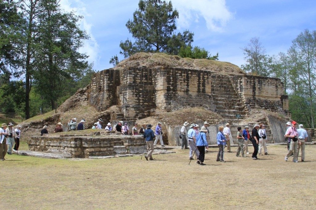 The group visiting a temple structure at Iximche
