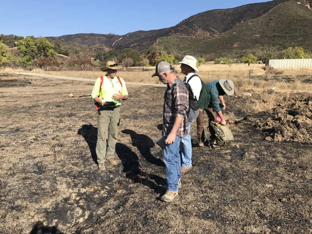 Dr. Gregory White and his team of volunteers surveys the fire landscape at Borax Lake.